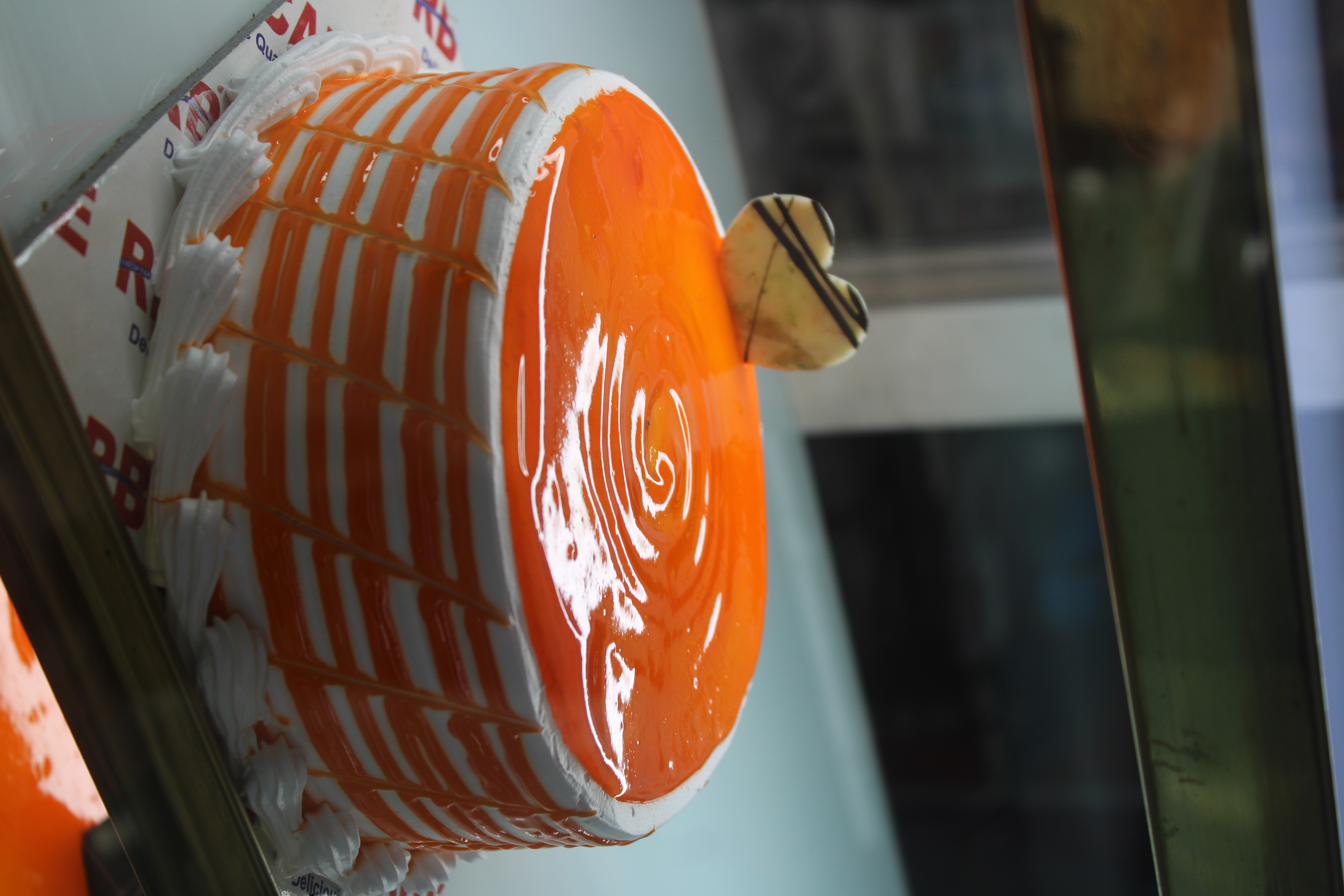 Orange frosted cake close-up
